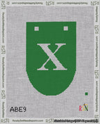 A taped needlepoint canvas with the design: Banner 18 mesh count Rounded X White on Green.