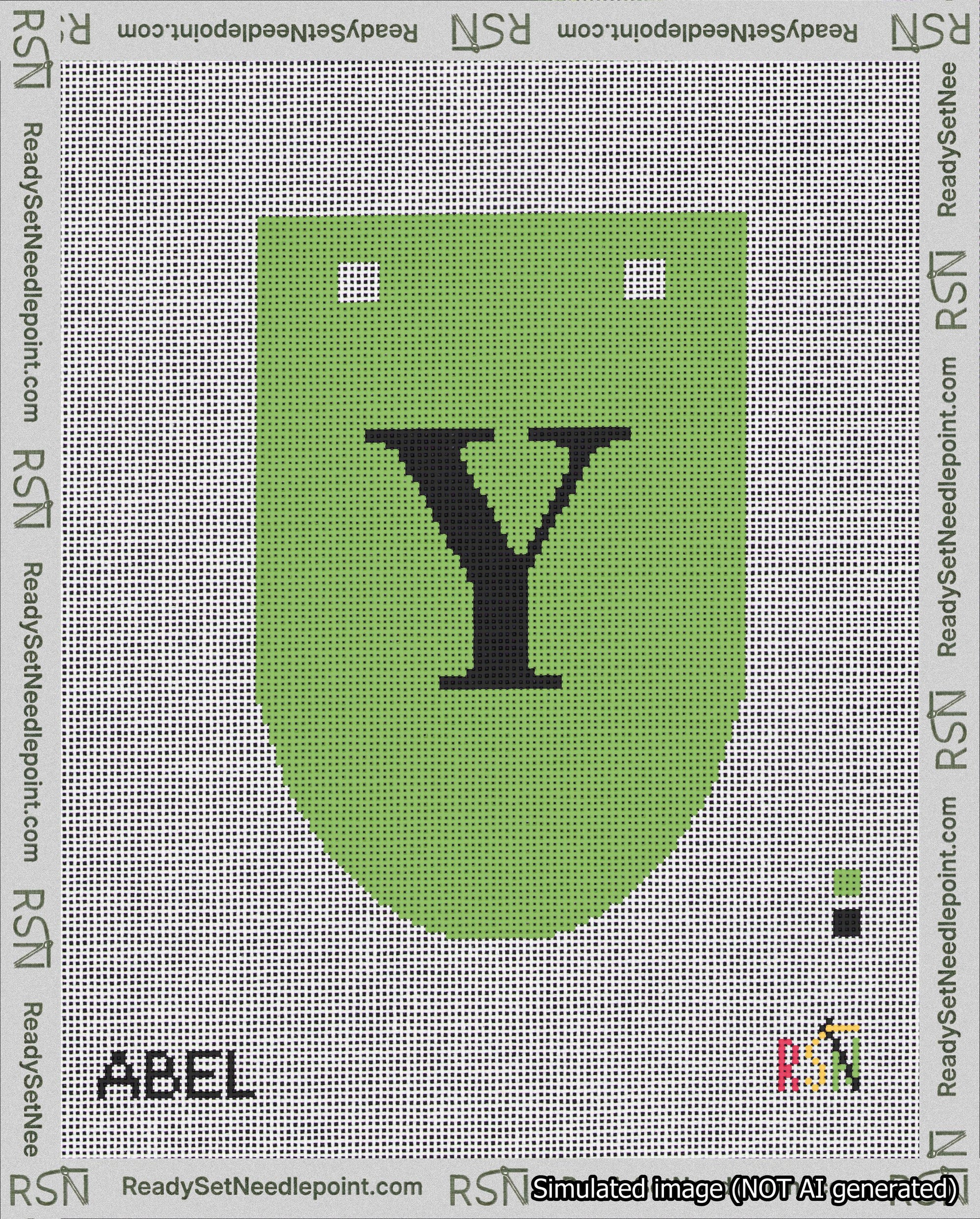A taped needlepoint canvas with the design: Banner 18 mesh count Rounded Y Black on Light Green.