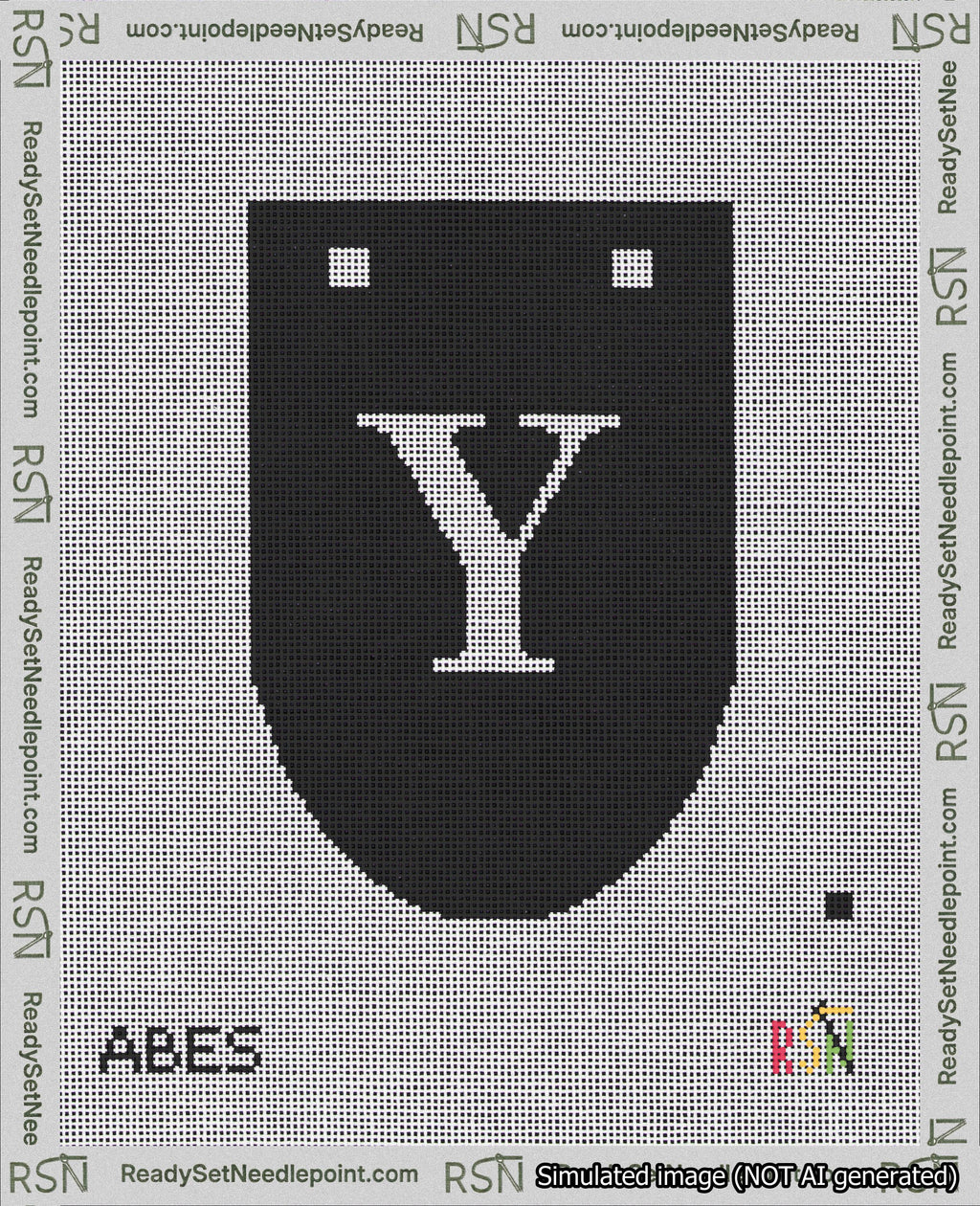 A taped needlepoint canvas with the design: Banner 18 mesh count Rounded Y White on Black.