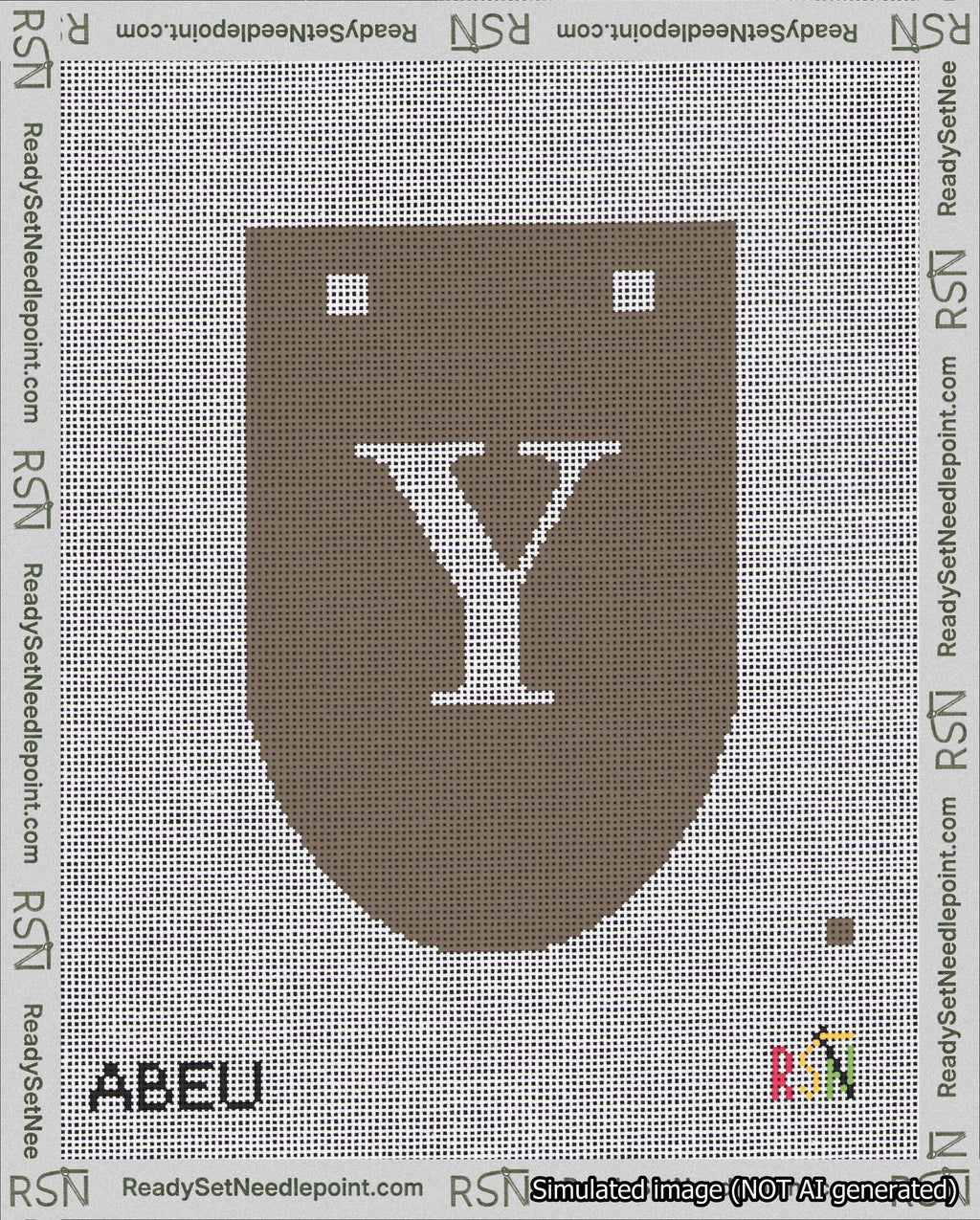 A taped needlepoint canvas with the design: Banner 18 mesh count Rounded Y White on Brown.