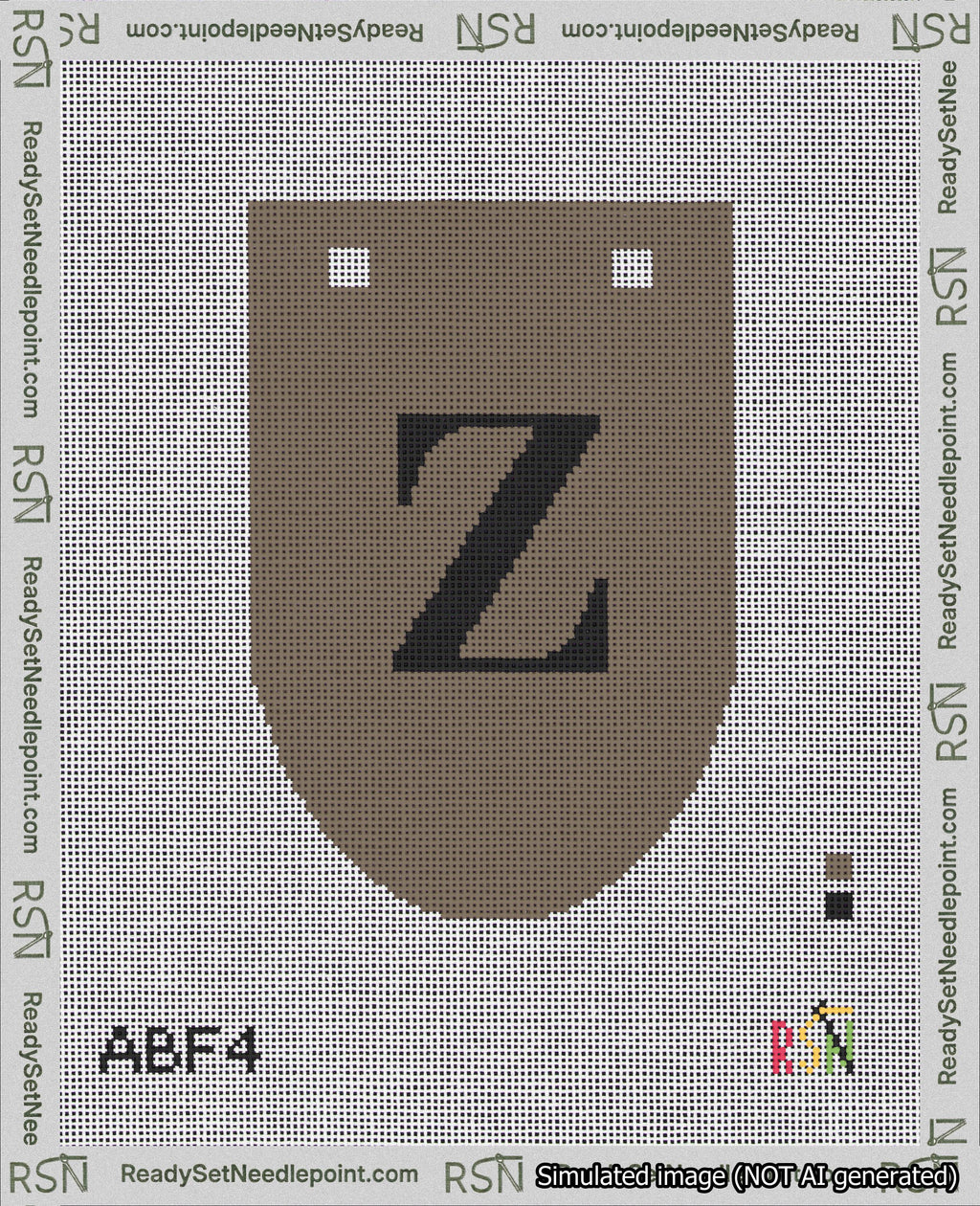 A taped needlepoint canvas with the design: Banner 18 mesh count Rounded Z Black on Brown.