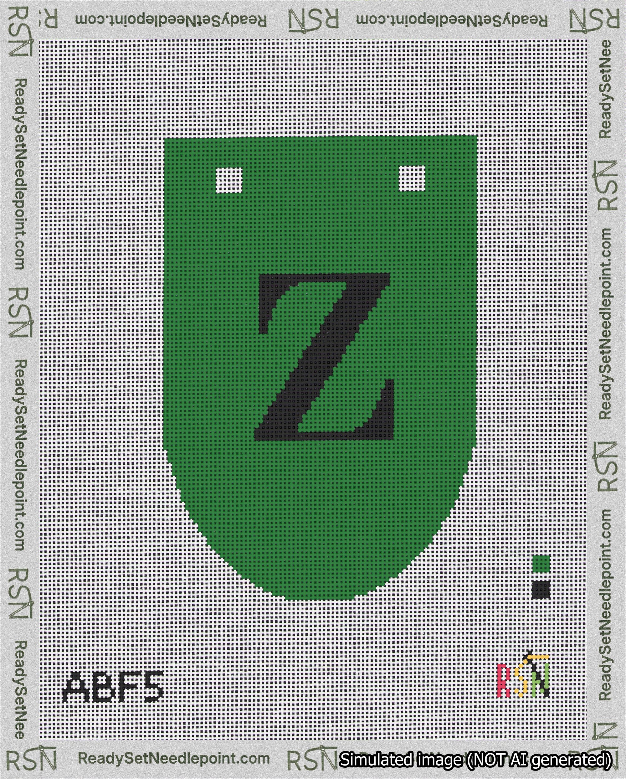A taped needlepoint canvas with the design: Banner 18 mesh count Rounded Z Black on Green.
