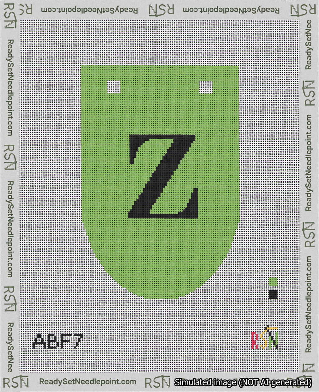 A taped needlepoint canvas with the design: Banner 18 mesh count Rounded Z Black on Light Green.