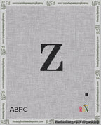 A taped needlepoint canvas with the design: Banner 18 mesh count Rounded Z Black on White.