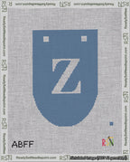 A taped needlepoint canvas with the design: Banner 18 mesh count Rounded Z White on Blue.