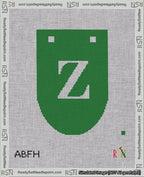 A taped needlepoint canvas with the design: Banner 18 mesh count Rounded Z White on Green.