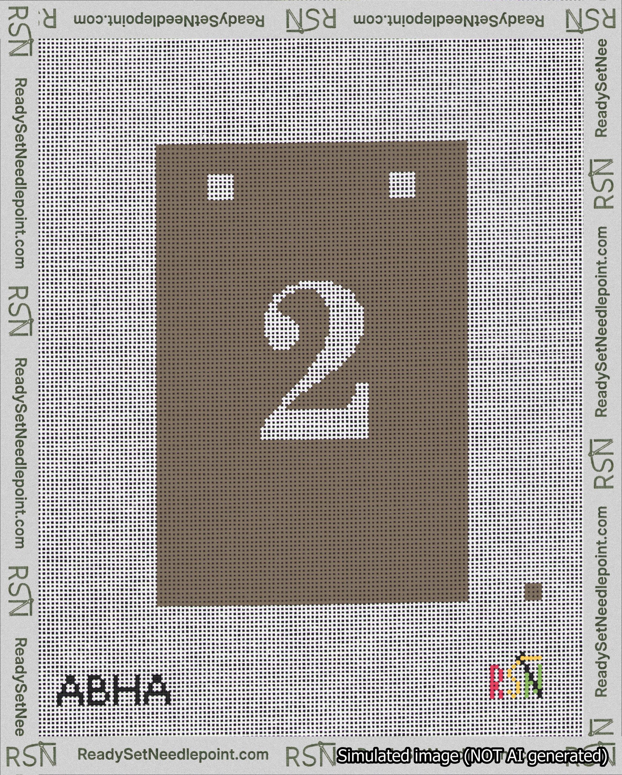 A taped needlepoint canvas with the design: Banner 18 mesh count Squared 2 White on Brown.