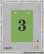 A taped needlepoint canvas with the design: Banner 18 mesh count Squared 3 Black on Light Green.