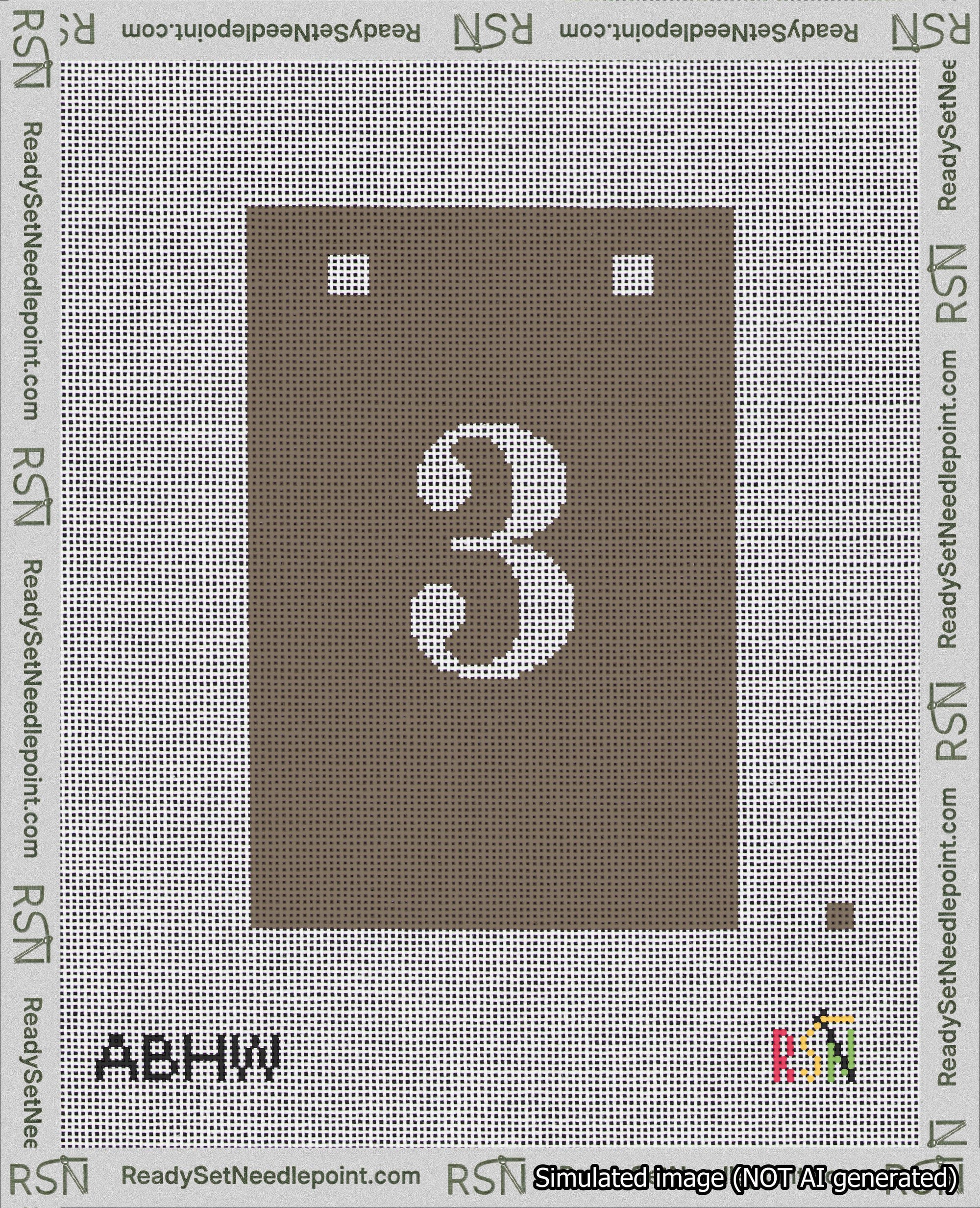 A taped needlepoint canvas with the design: Banner 18 mesh count Squared 3 White on Brown.