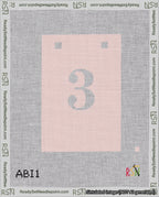A taped needlepoint canvas with the design: Banner 18 mesh count Squared 3 White on Pink.