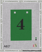 A taped needlepoint canvas with the design: Banner 18 mesh count Squared 4 Black on Green.