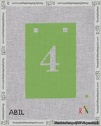 A taped needlepoint canvas with the design: Banner 18 mesh count Squared 4 White on Light Green.