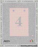 A taped needlepoint canvas with the design: Banner 18 mesh count Squared 4 White on Pink.