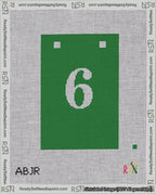 A taped needlepoint canvas with the design: Banner 18 mesh count Squared 6 White on Green.
