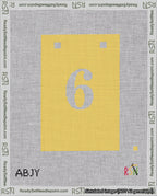 A taped needlepoint canvas with the design: Banner 18 mesh count Squared 6 White on Yellow.