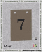 A taped needlepoint canvas with the design: Banner 18 mesh count Squared 7 Black on Brown.