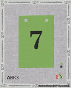 A taped needlepoint canvas with the design: Banner 18 mesh count Squared 7 Black on Light Green.