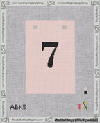A taped needlepoint canvas with the design: Banner 18 mesh count Squared 7 Black on Pink.