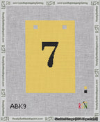 A taped needlepoint canvas with the design: Banner 18 mesh count Squared 7 Black on Yellow.