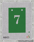 A taped needlepoint canvas with the design: Banner 18 mesh count Squared 7 White on Green.