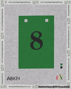 A taped needlepoint canvas with the design: Banner 18 mesh count Squared 8 Black on Green.