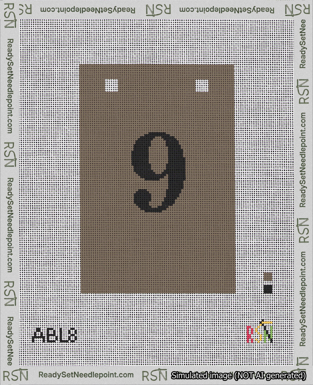 A taped needlepoint canvas with the design: Banner 18 mesh count Squared 9 Black on Brown.