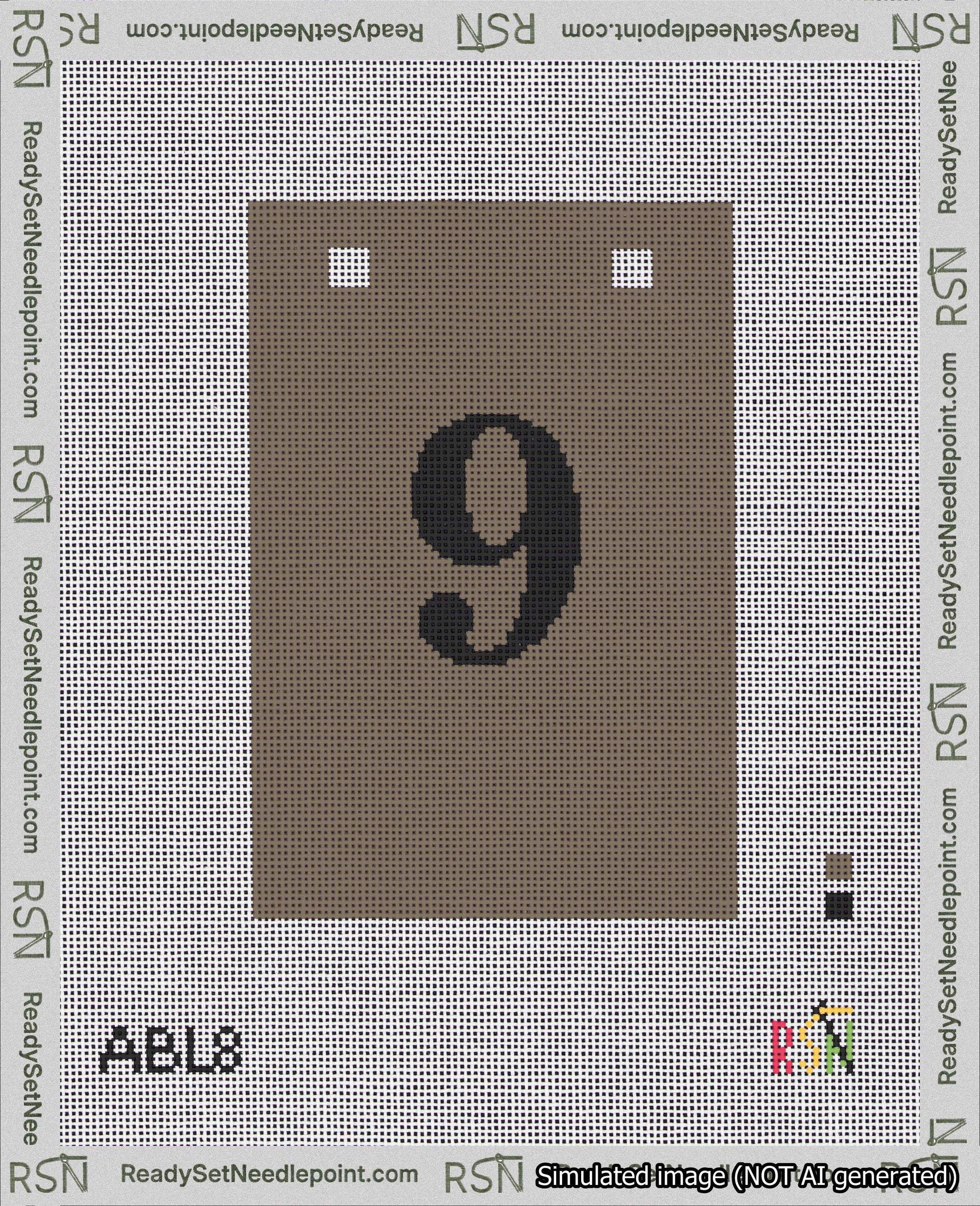 A taped needlepoint canvas with the design: Banner 18 mesh count Squared 9 Black on Brown.