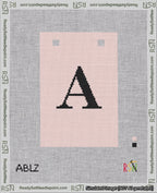 A taped needlepoint canvas with the design: Banner 18 mesh count Squared A Black on Pink.