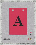 A taped needlepoint canvas with the design: Banner 18 mesh count Squared A Black on Red.