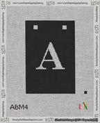 A taped needlepoint canvas with the design: Banner 18 mesh count Squared A White on Black.