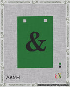 A taped needlepoint canvas with the design: Banner 18 mesh count Squared Ampersand Black on Green.