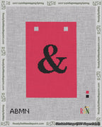A taped needlepoint canvas with the design: Banner 18 mesh count Squared Ampersand Black on Red.