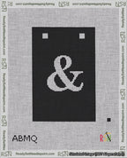 A taped needlepoint canvas with the design: Banner 18 mesh count Squared Ampersand White on Black.