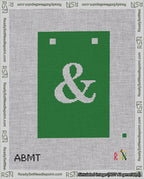 A taped needlepoint canvas with the design: Banner 18 mesh count Squared Ampersand White on Green.