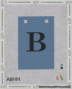 A taped needlepoint canvas with the design: Banner 18 mesh count Squared B Black on Blue.