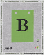 A taped needlepoint canvas with the design: Banner 18 mesh count Squared B Black on Light Green.