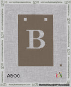 A taped needlepoint canvas with the design: Banner 18 mesh count Squared B White on Brown.