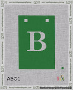 A taped needlepoint canvas with the design: Banner 18 mesh count Squared B White on Green.