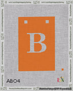 A taped needlepoint canvas with the design: Banner 18 mesh count Squared B White on Orange.