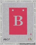 A taped needlepoint canvas with the design: Banner 18 mesh count Squared B White on Red.