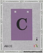 A taped needlepoint canvas with the design: Banner 18 mesh count Squared C Black on Purple.