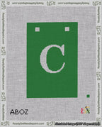 A taped needlepoint canvas with the design: Banner 18 mesh count Squared C White on Green.