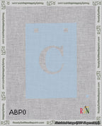 A taped needlepoint canvas with the design: Banner 18 mesh count Squared C White on Light Blue.