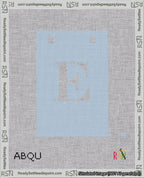 A taped needlepoint canvas with the design: Banner 18 mesh count Squared E White on Light Blue.