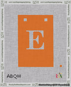 A taped needlepoint canvas with the design: Banner 18 mesh count Squared E White on Orange.