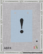 A taped needlepoint canvas with the design: Banner 18 mesh count Squared Exclamation Black on Light Blue.