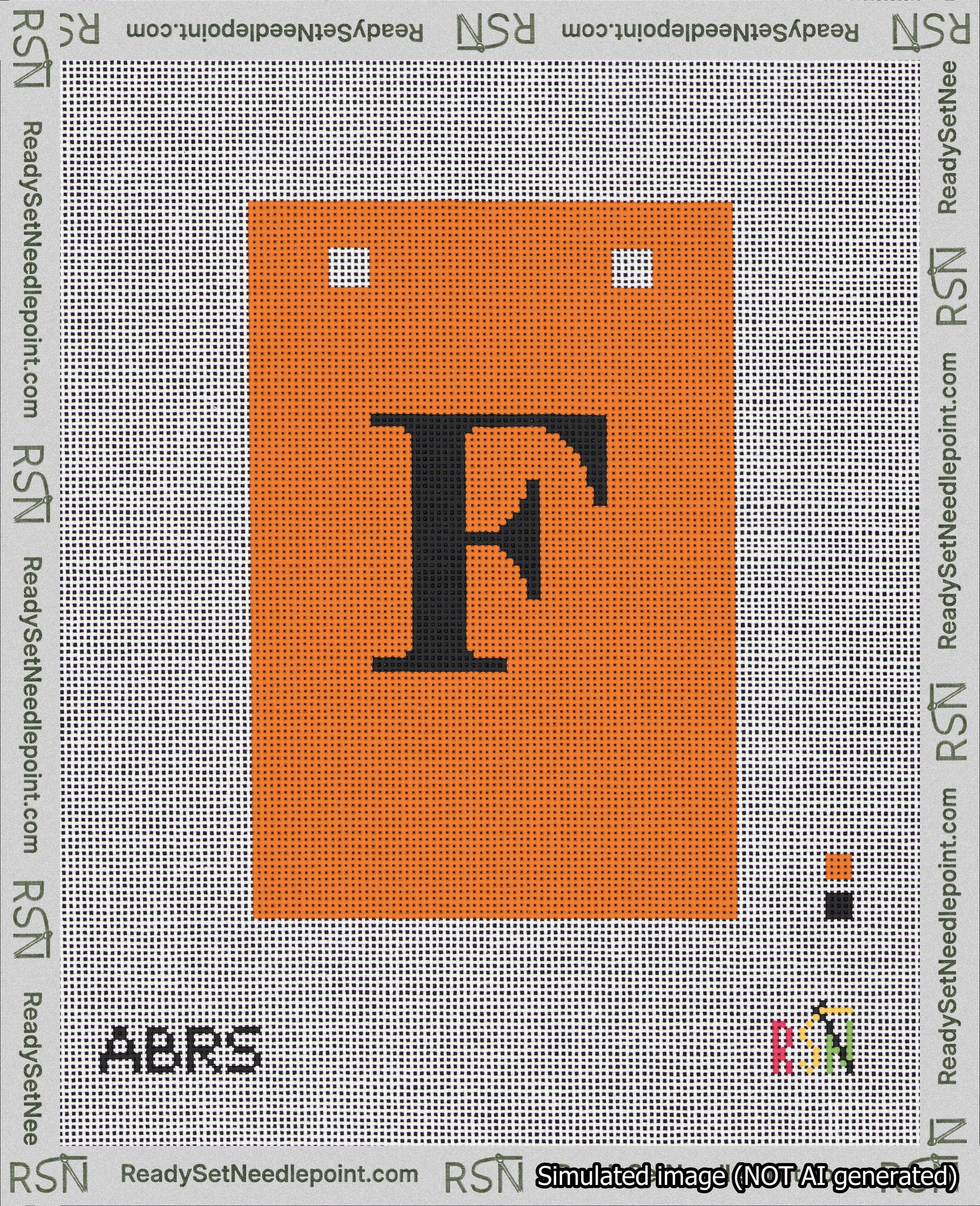 A taped needlepoint canvas with the design: Banner 18 mesh count Squared F Black on Orange.