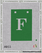 A taped needlepoint canvas with the design: Banner 18 mesh count Squared F White on Green.