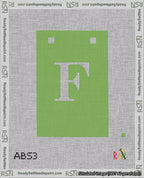 A taped needlepoint canvas with the design: Banner 18 mesh count Squared F White on Light Green.
