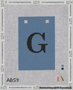 A taped needlepoint canvas with the design: Banner 18 mesh count Squared G Black on Blue.